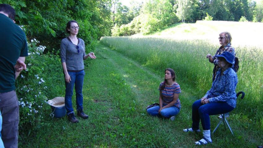 Woman gives tour of nature preserve