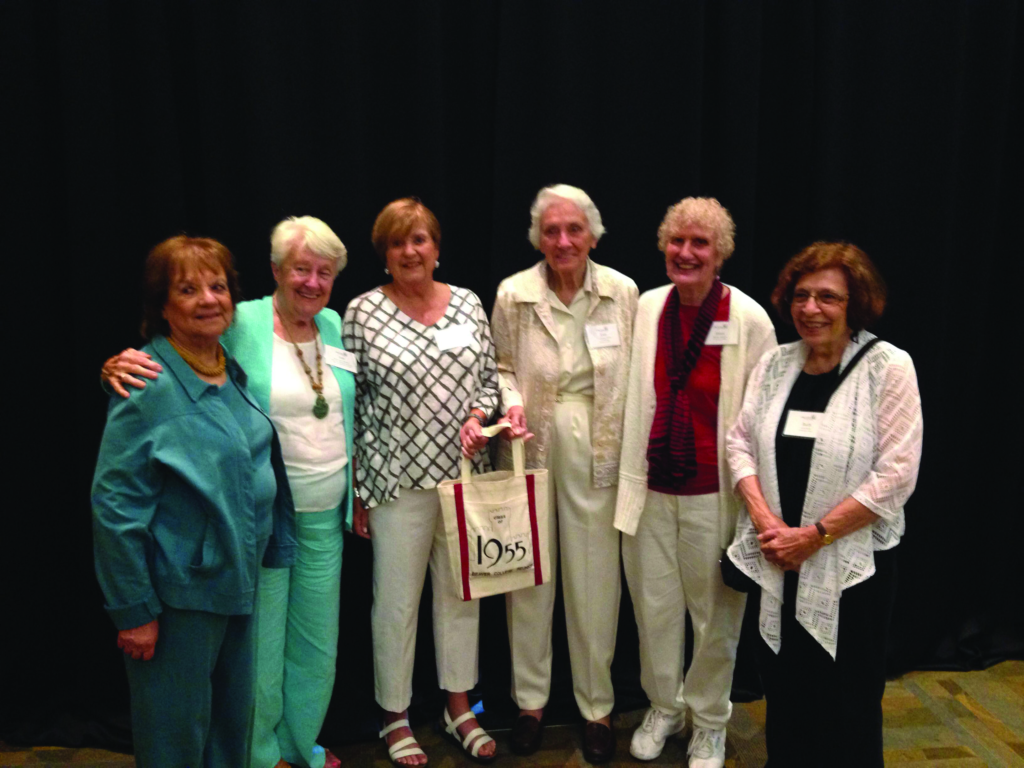 Members of the Class of ’55 posing together.