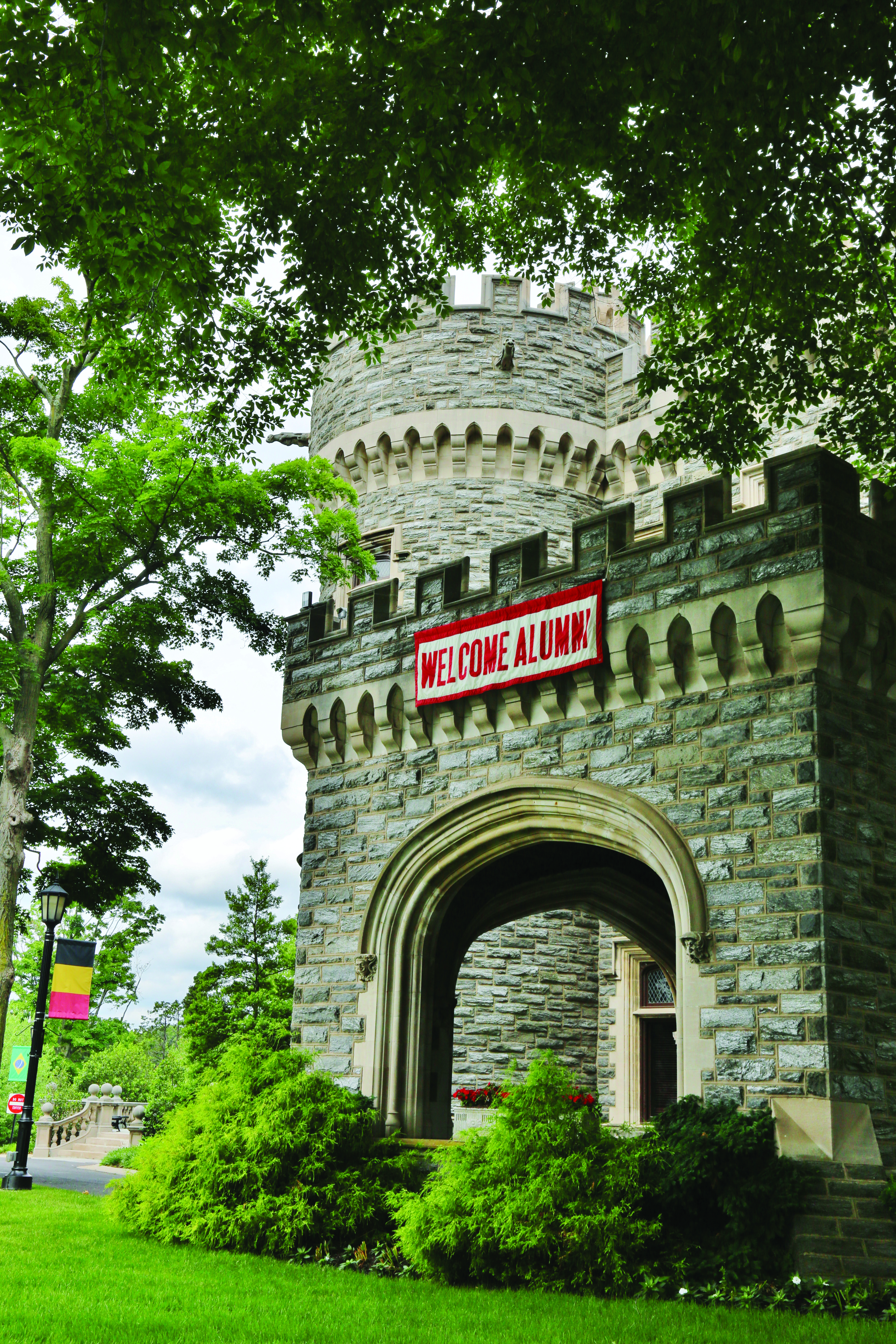 Grey Towers Castle with a banner welcoming alumni.