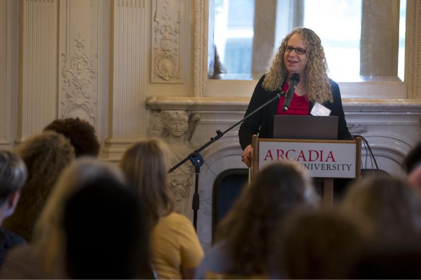 Rachel Levine speaks in Grey Towers Castle in front of a room of students