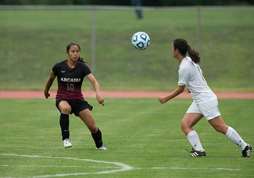 Arcadia woman soccer player against rival team.