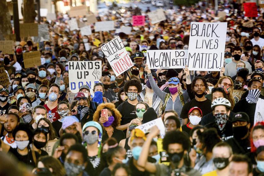 A masked crowd in a Black Lives Matter protest.