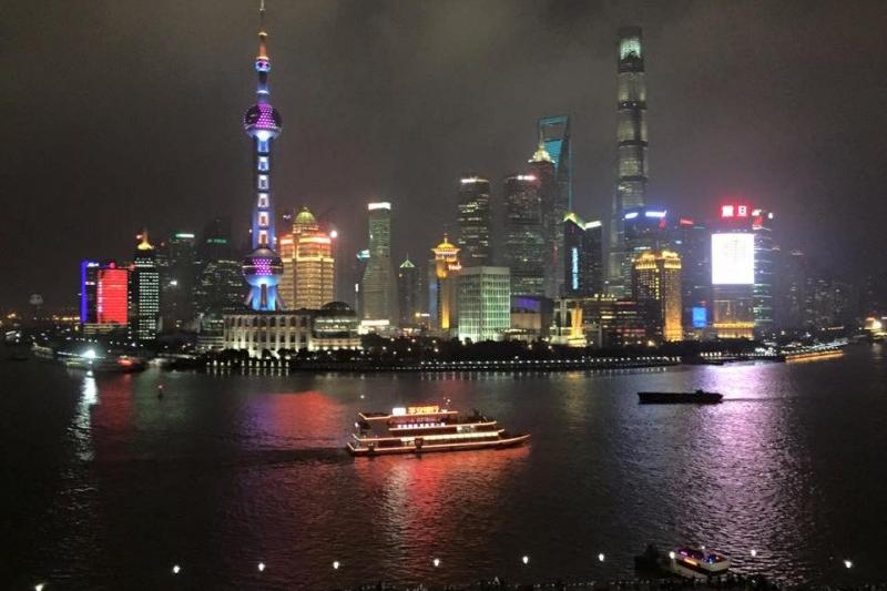 Large and colorful skyline in China at night.