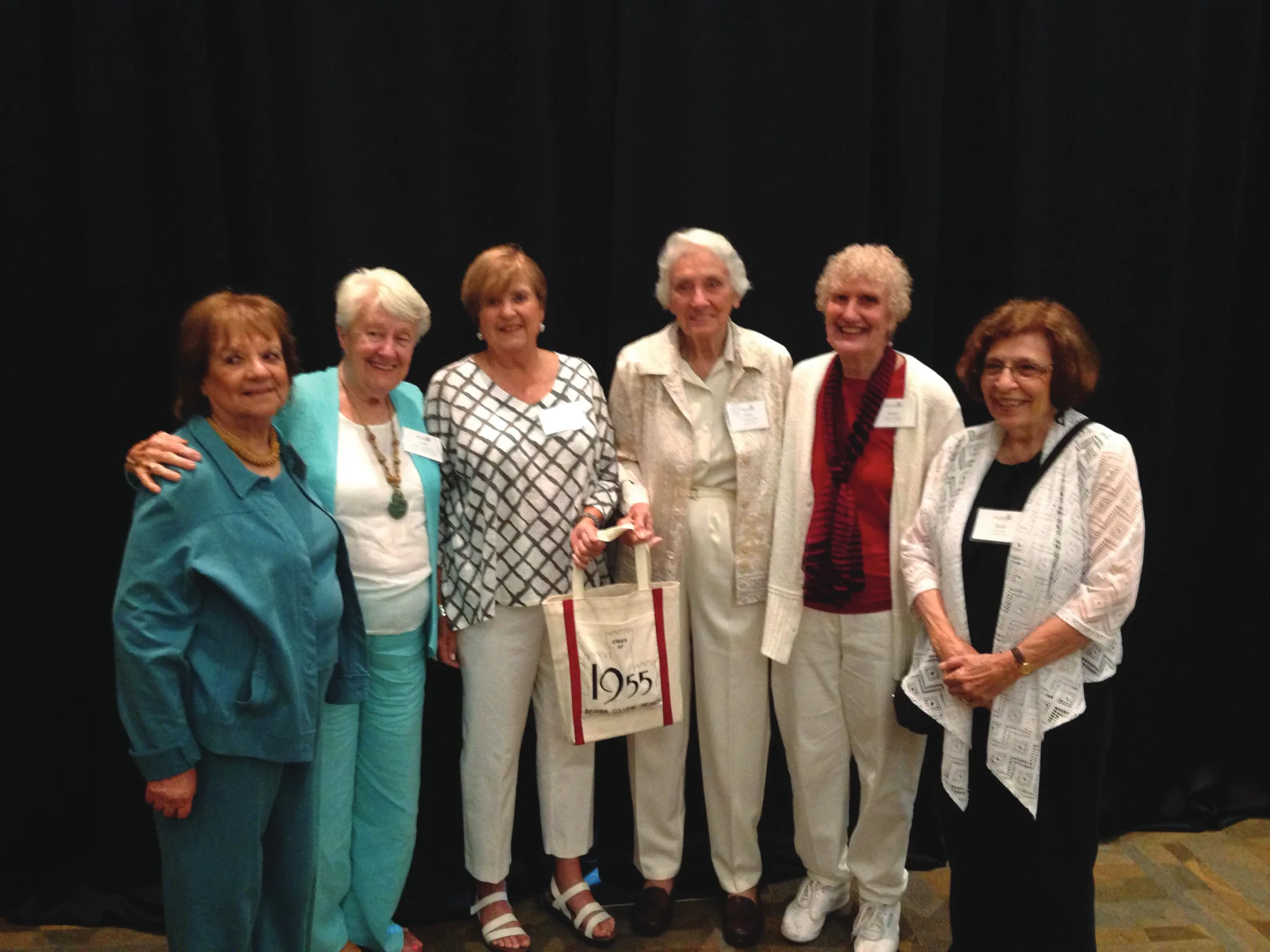 A group photo of several alumni students of the Class of 1955