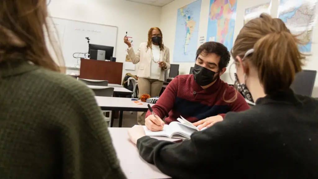 Students work on a French assignment in class.