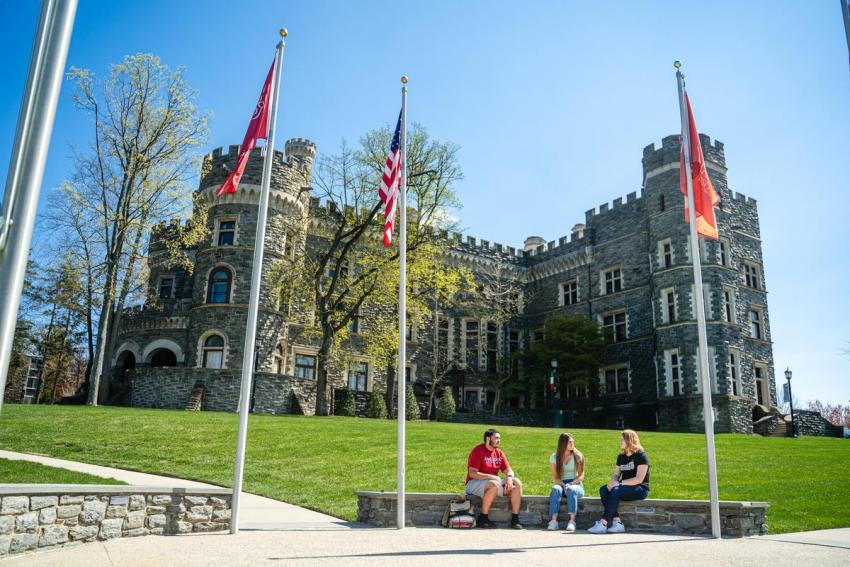 Grey Towers Castle with students outside