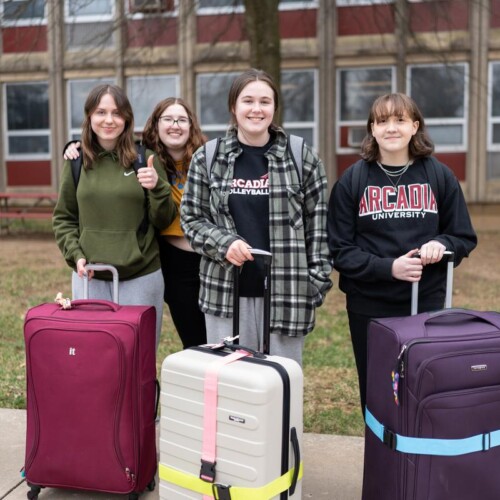 First year students ready to go on preview with packed suitcases