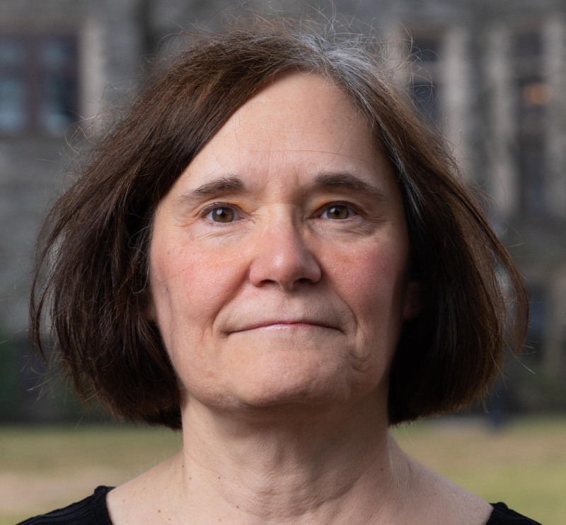 The headshot of Patricia Jenners with a blurred castle background