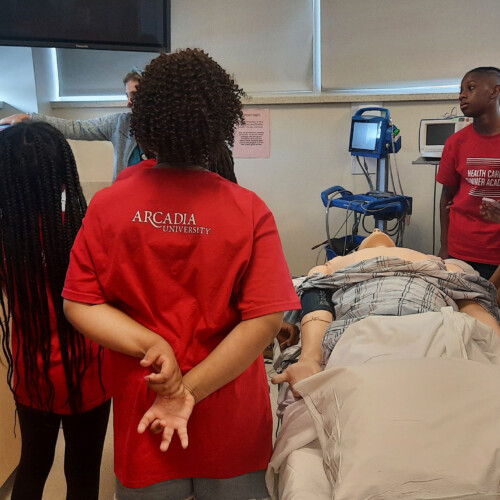 Visiting secondary students take a look at the College of Health Sciences teaching areas and labs.