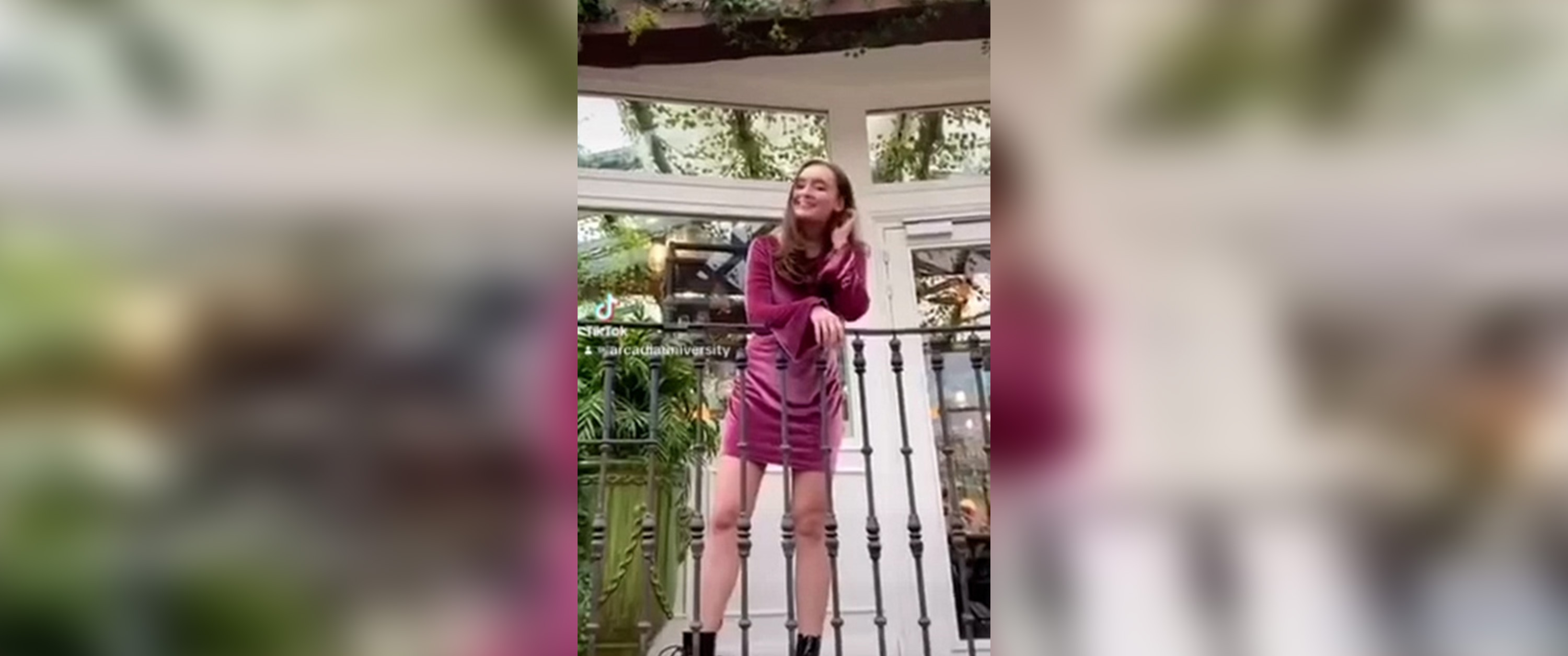 An Arcadia student poses on a balcony in Europe.