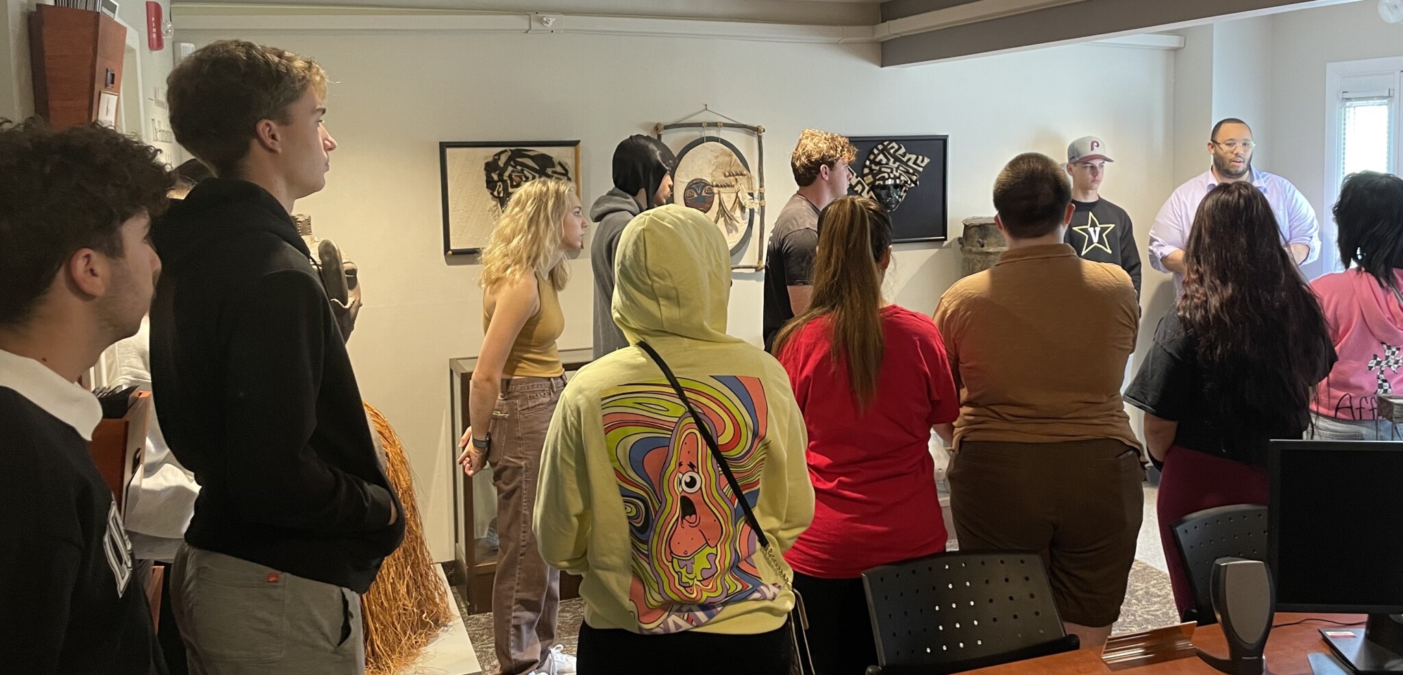 Students taking a tour of a cultural exhibition