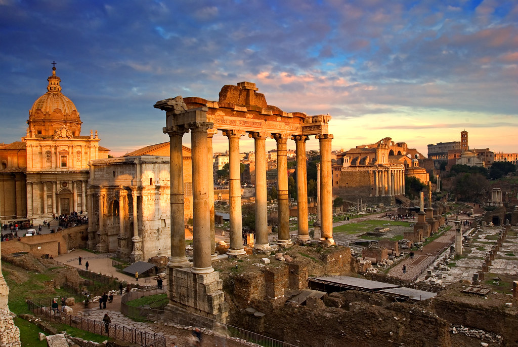 ancient ruins in Rome, Italy, golden light, blue skies, white stone