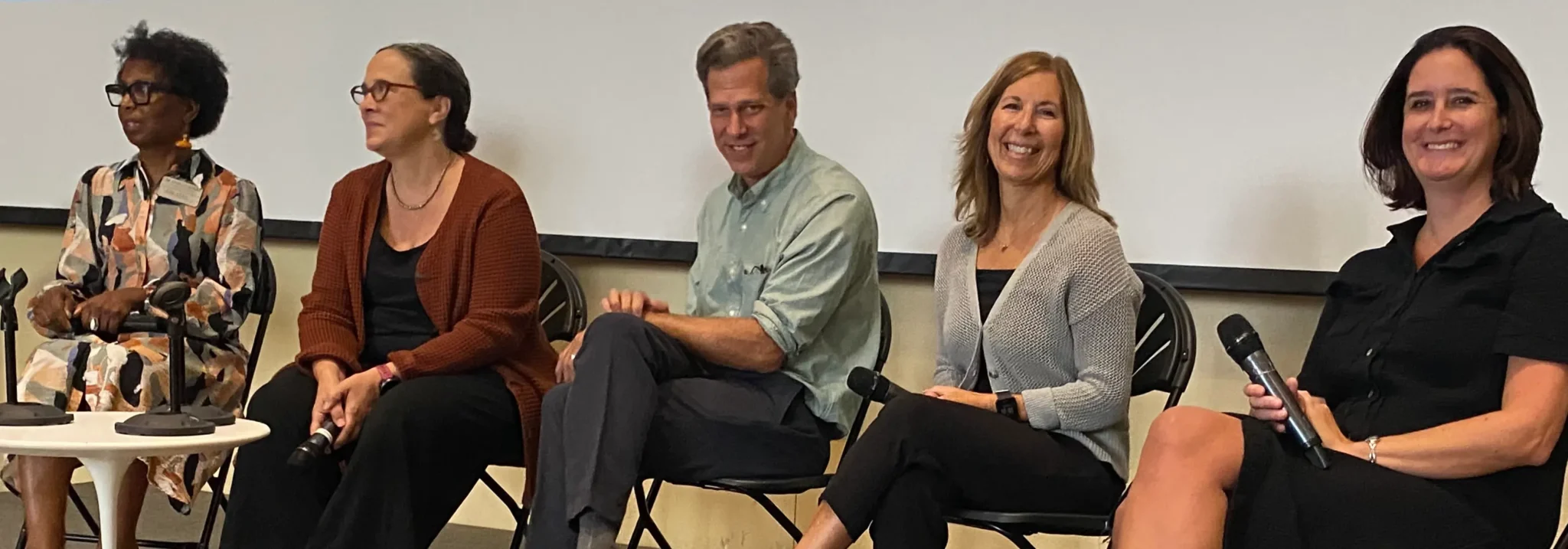 Angela McNeil, Ellen Skilton, Peter Siskind, Amy Henning, and Collene Pernicello seated on stage in the Great Room