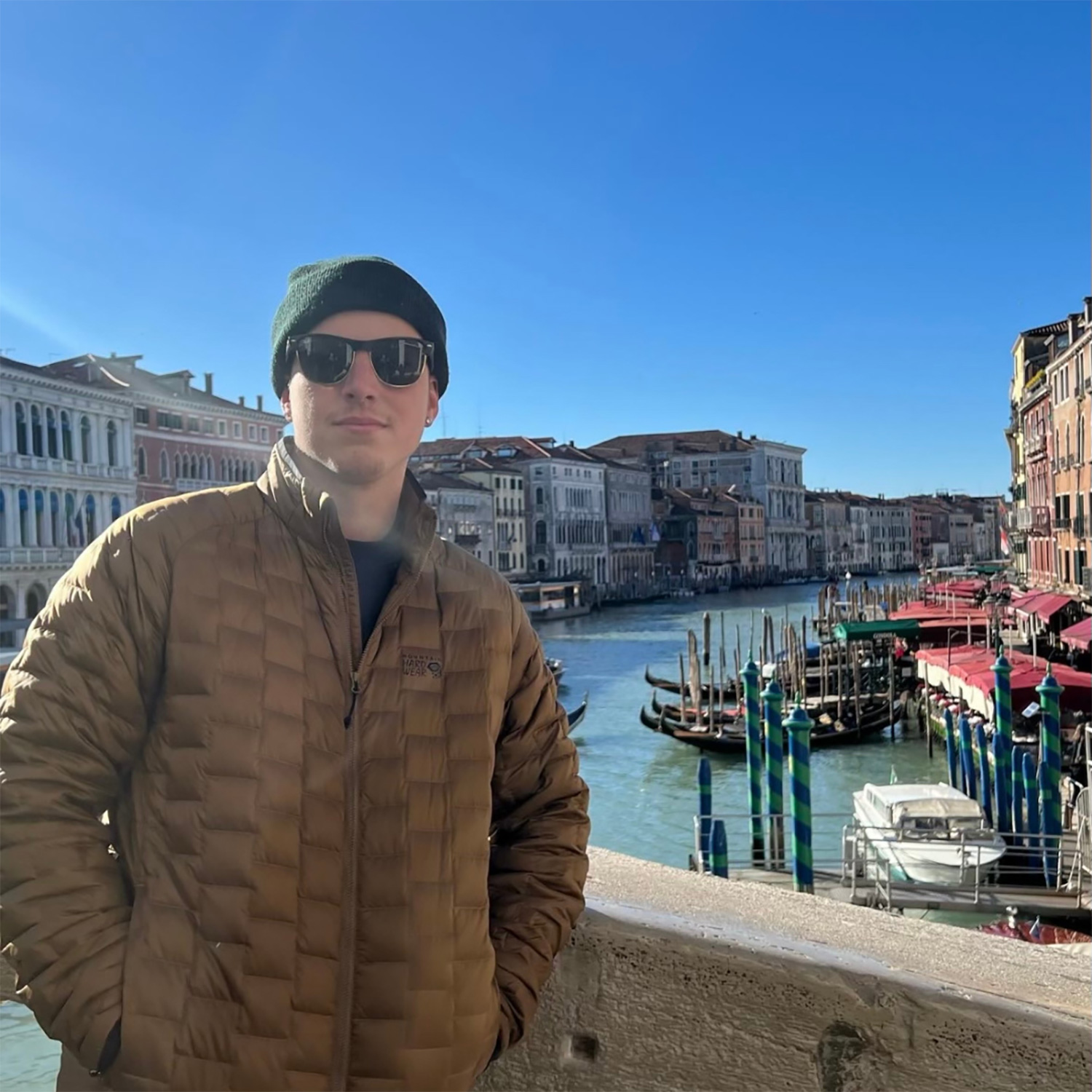 Armando Verdaro standing in front of a river in Italy.