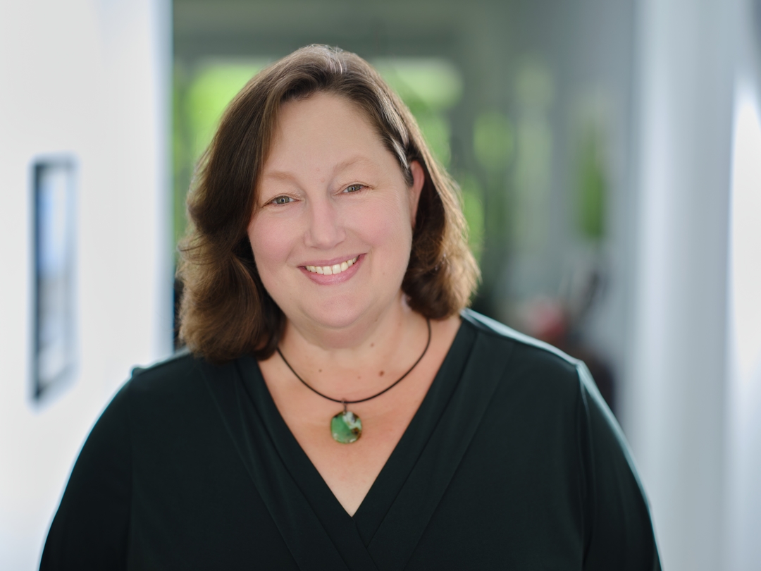 Headshot of Deirdre Swinden, a published Alumni.