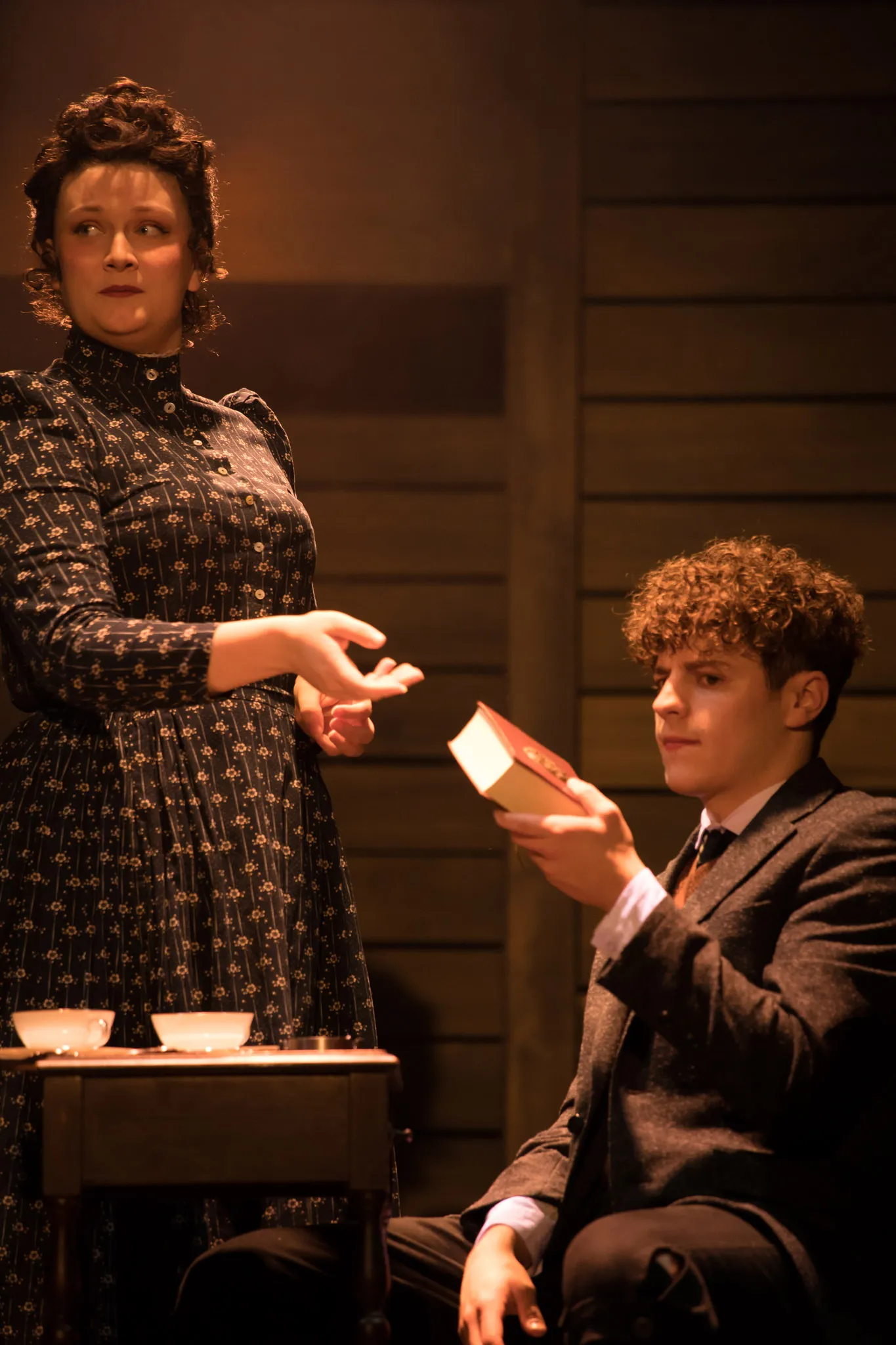 Two actors on stage for the Spring Awakening play.