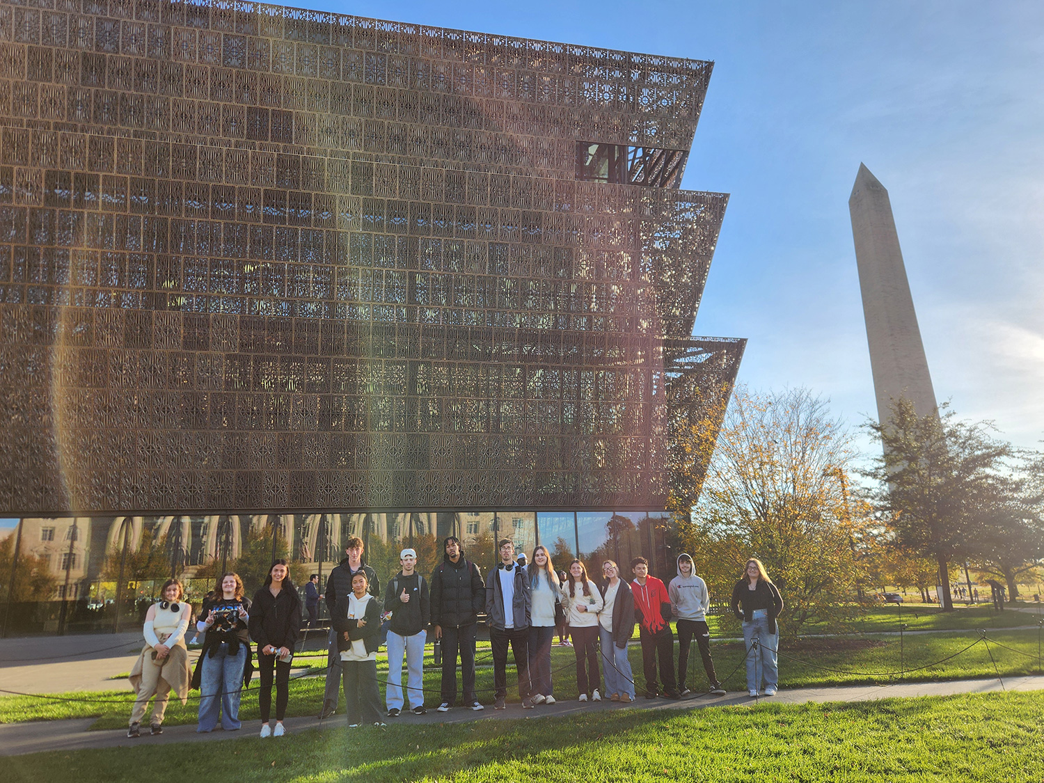 Prof. McCreery's FYS class standing outside of a museum.