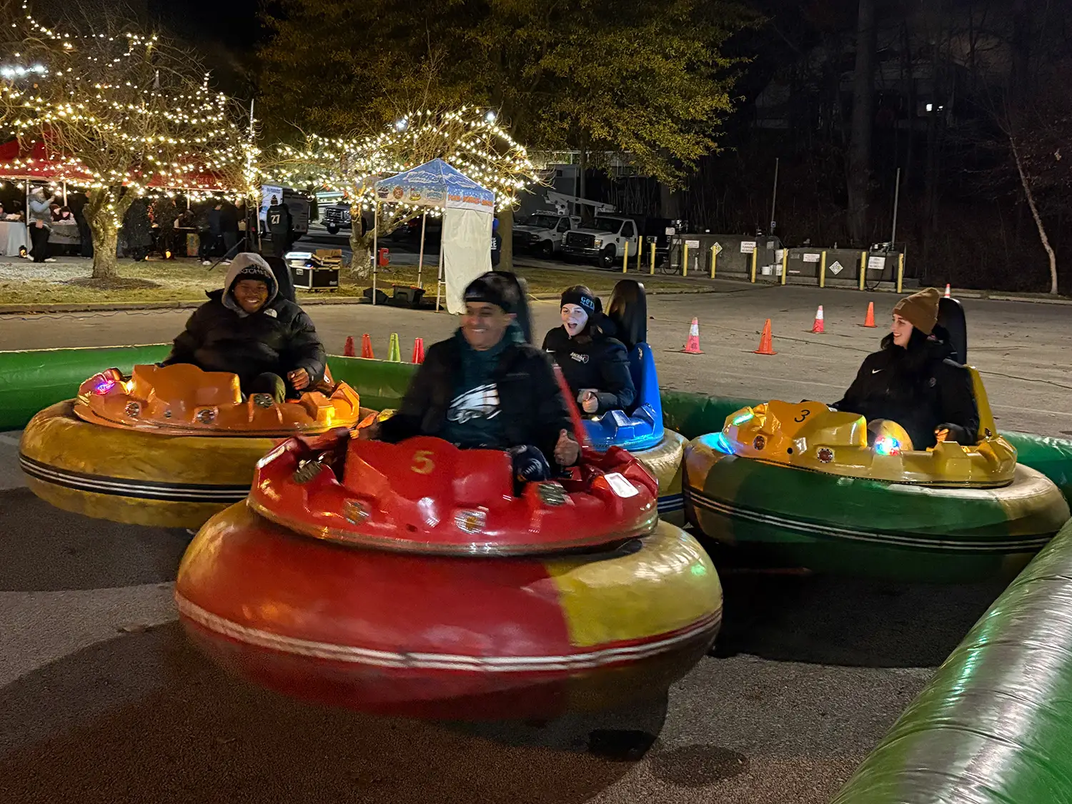 Students using the bumper cars at Get Lit.