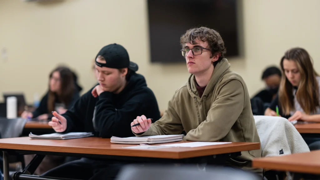 Mathematics students listen in to a Calculus lecture.