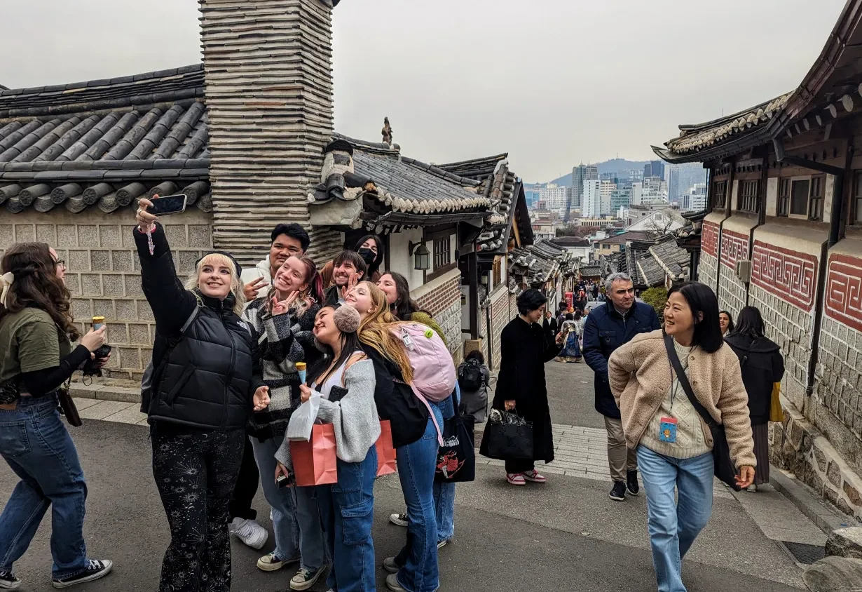 students in South Korea taking a picture together