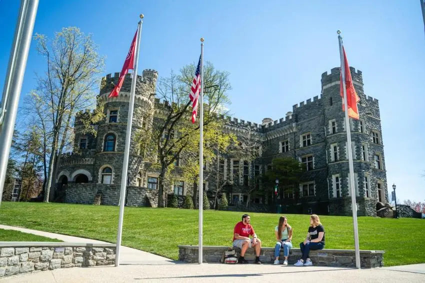 Grey Towers Castle with students outside