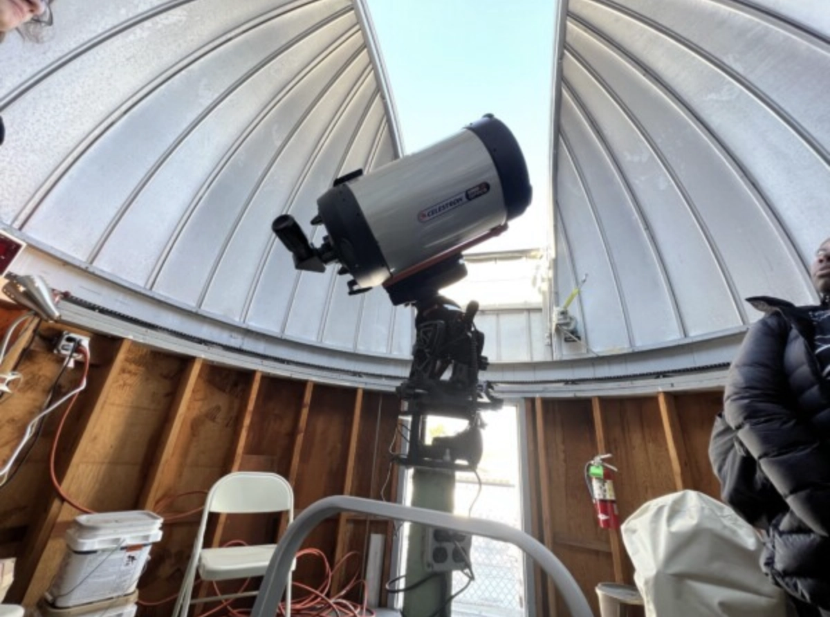 Students viewing the sky in the observatory