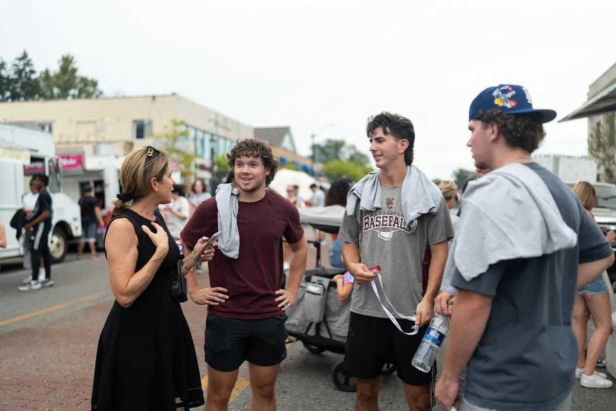 Kathy Orr talks to students at the Glenside Food Truck Festival