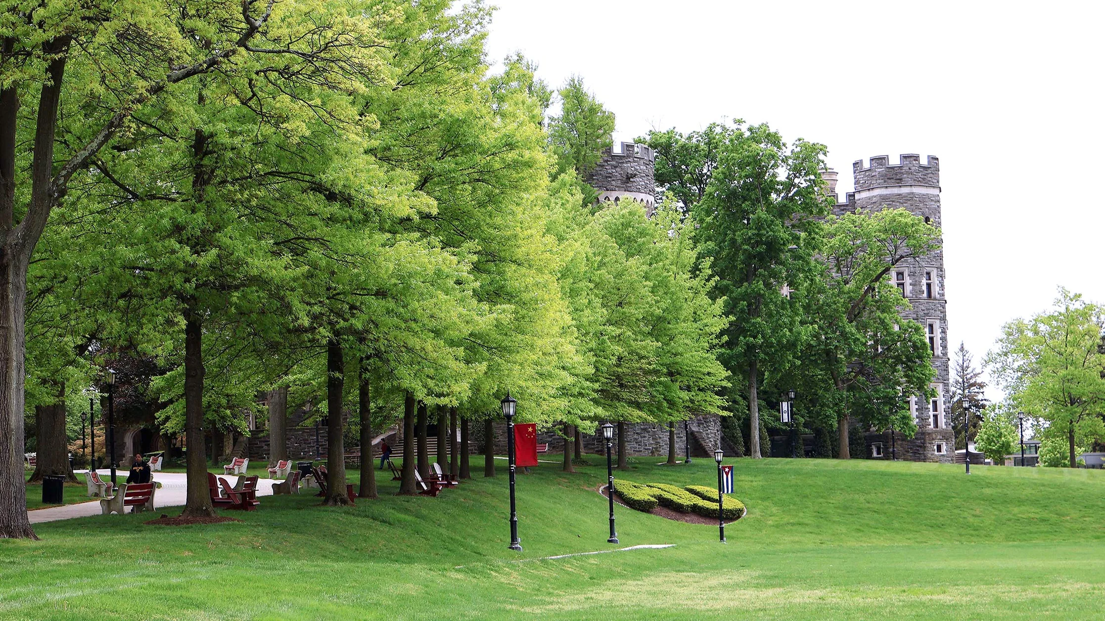 The bright green lawn at Arcadia University on a spring day.