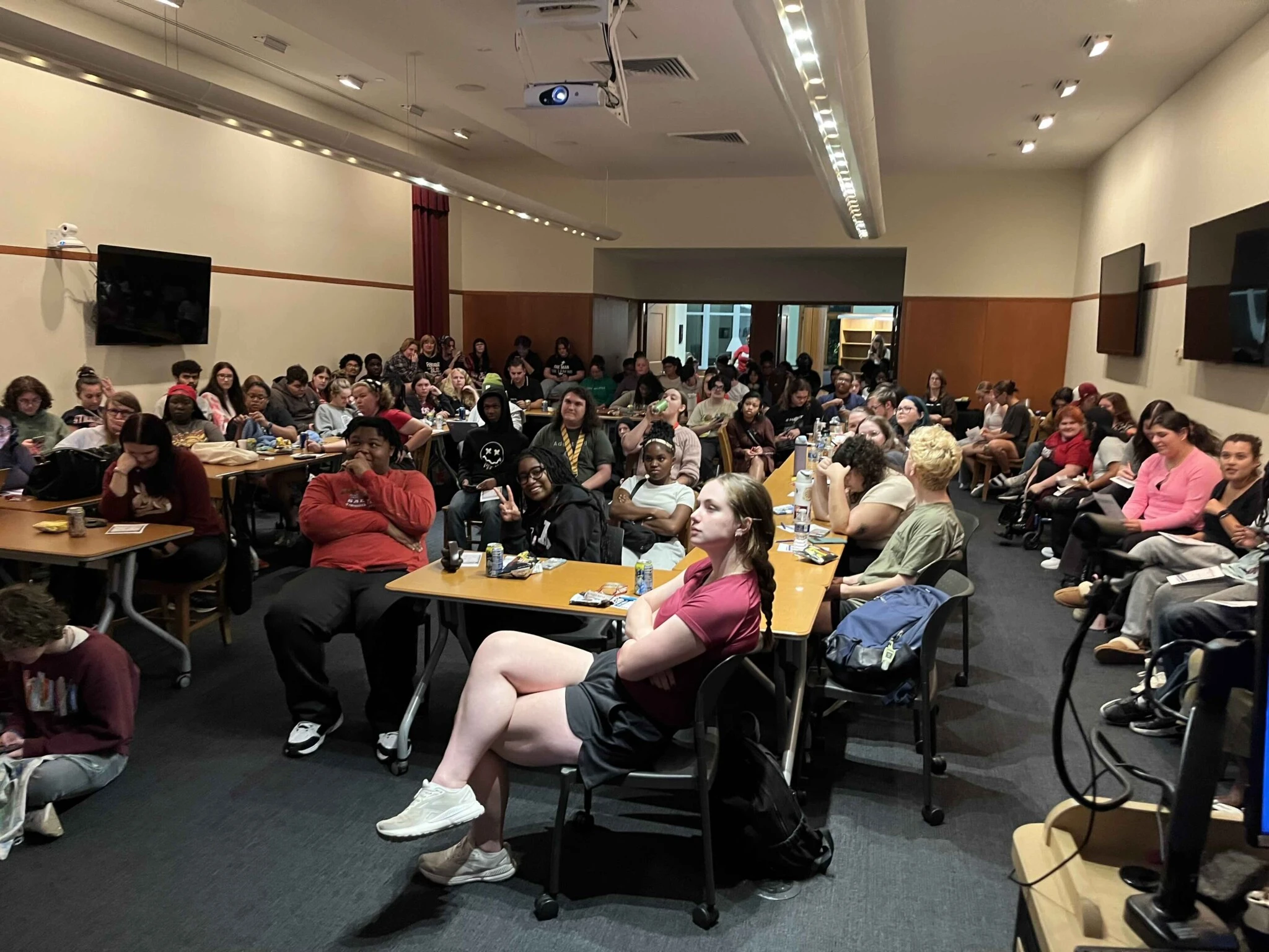 students fill the beaver college room of landman library watching the presidential debate