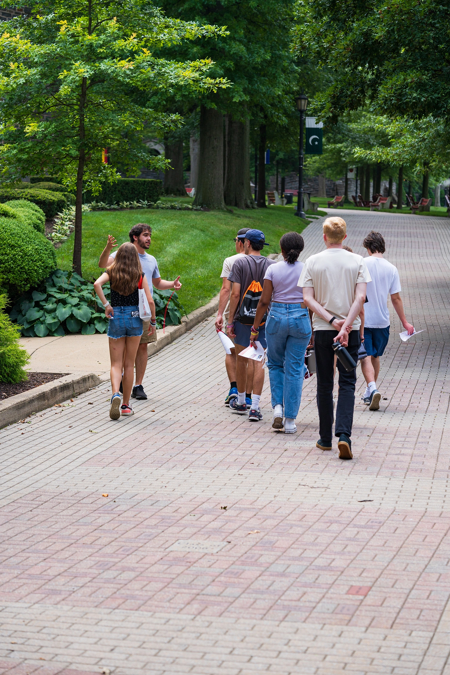 Students taking a tour of Arcadia's campus.