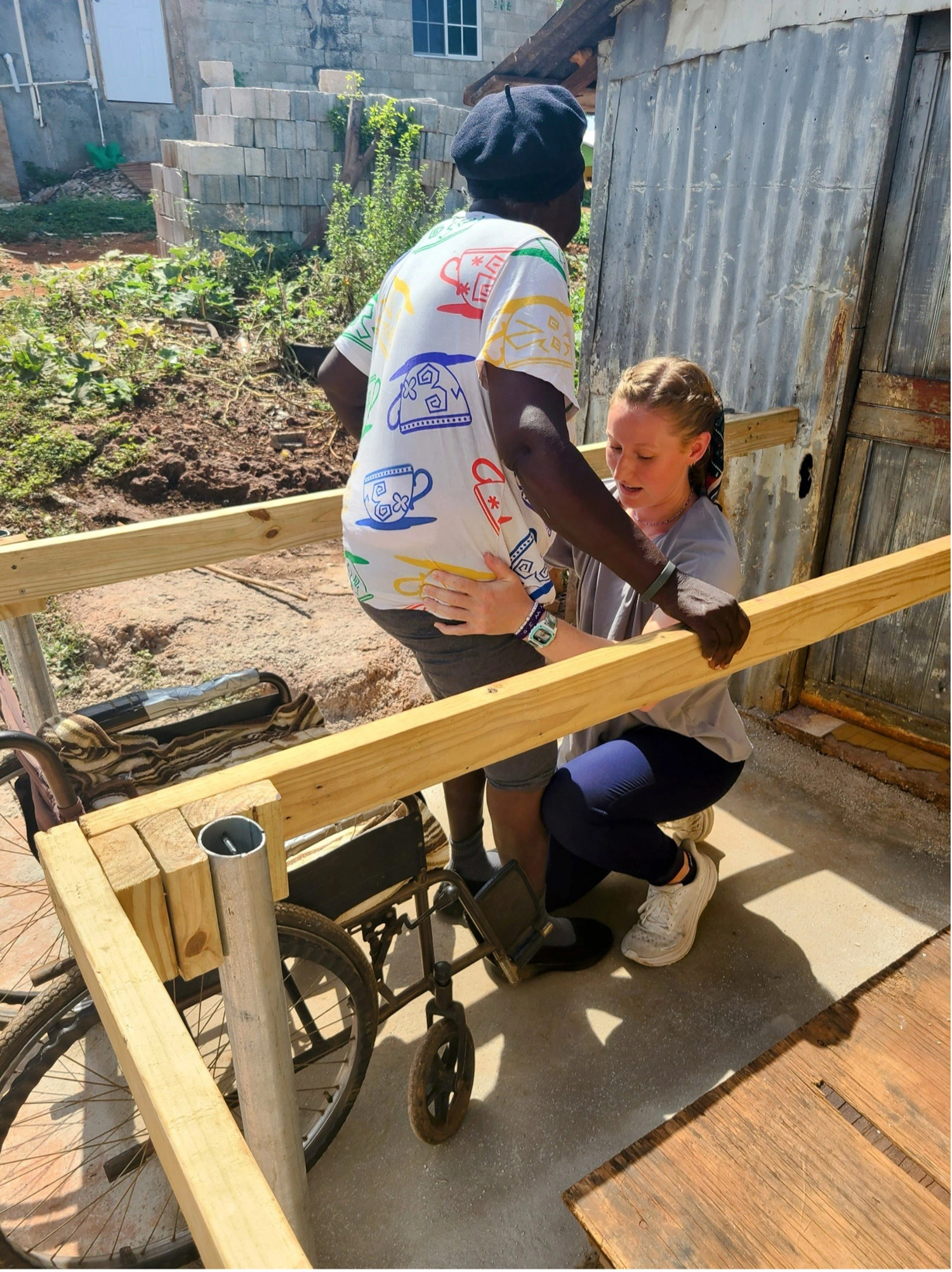 A DPT student and patient in Jamaica.