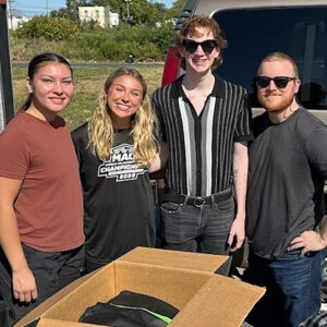 Dr. Fields with his students at the community event.