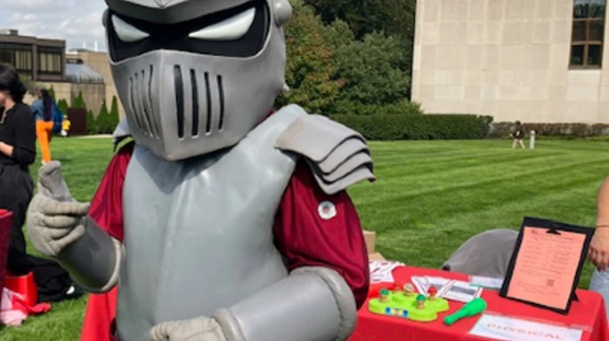 Archie, the mascot, representing at a college event