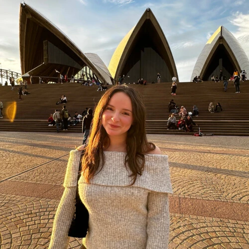 Sydney Boudreau in front of the Sydney Opera House.