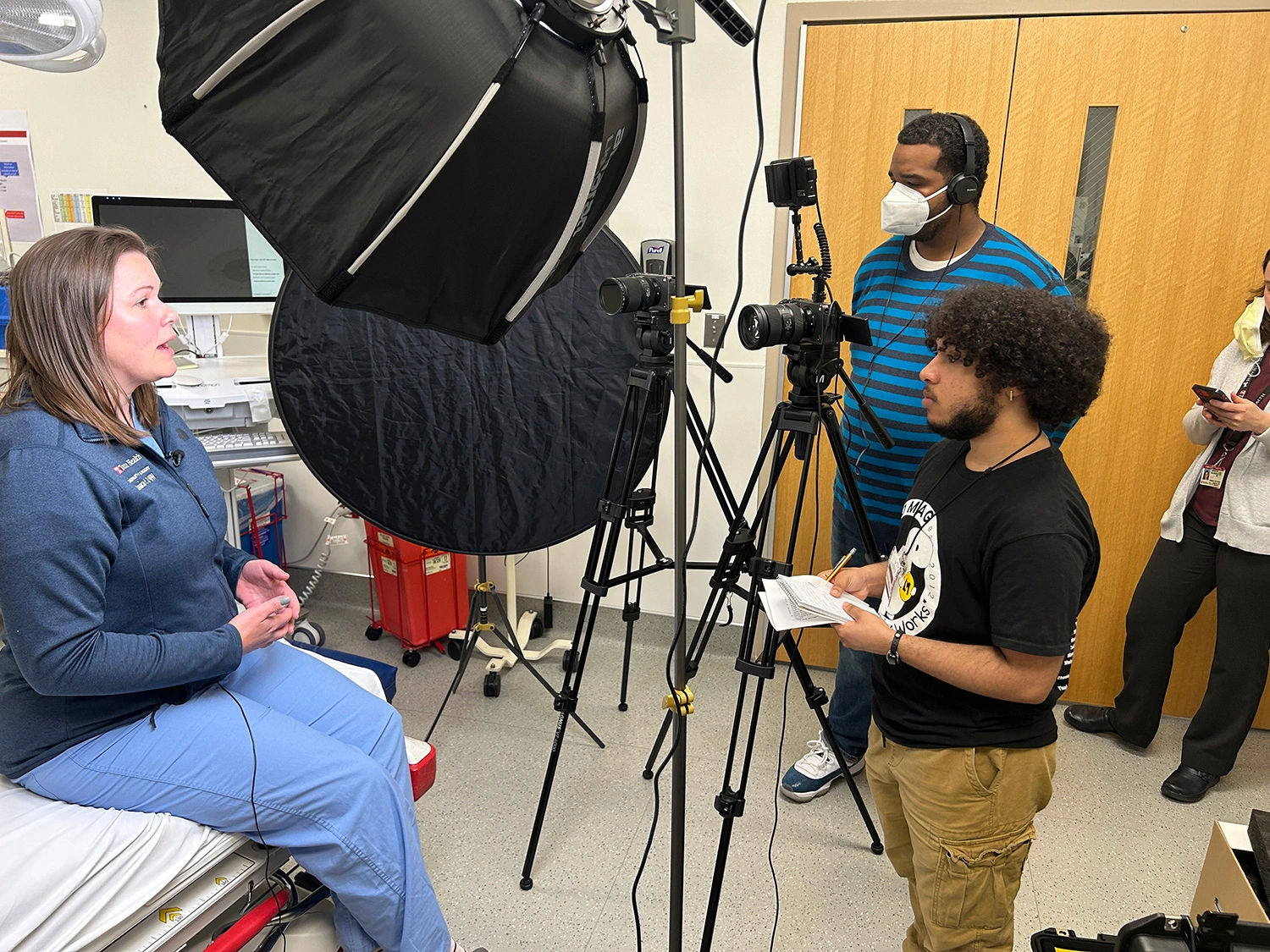 Ethan Rodriguez conducting an interview.