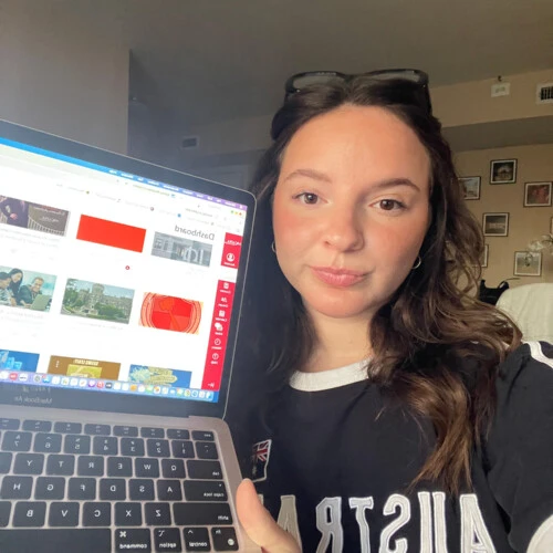 Sydney Boudreau ’25 showing the Canvas homepage on her laptop.