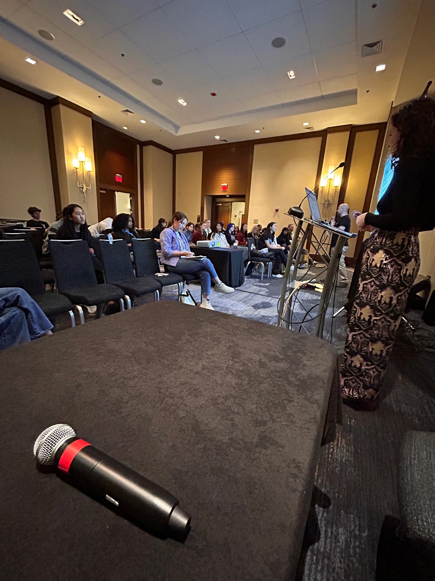 A microphone on a table before a presentation.