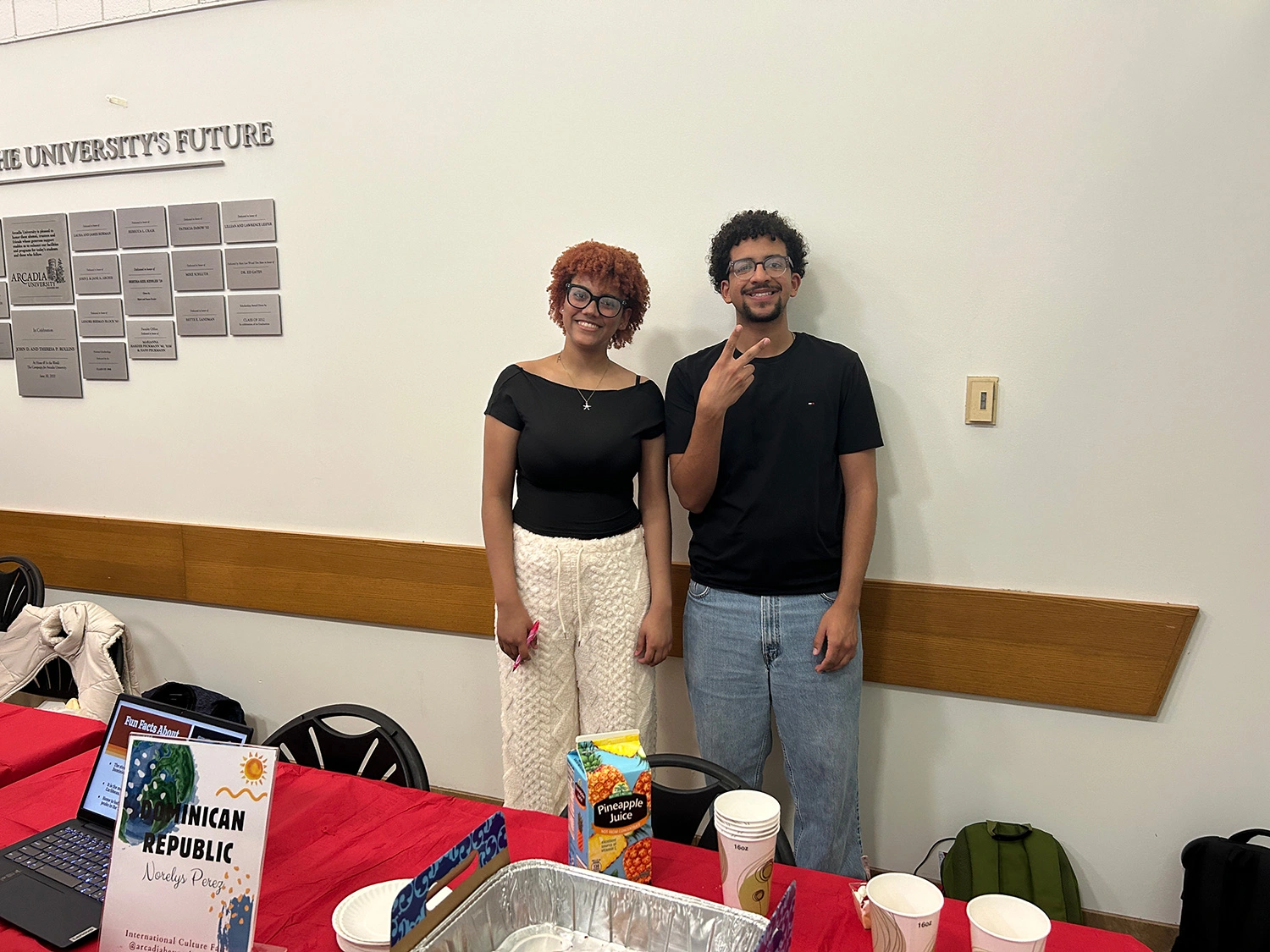 Norelys Perez ’26 (left) and Ian Catalino-Vasquez ’28 (right) at the Domincan Republic table.