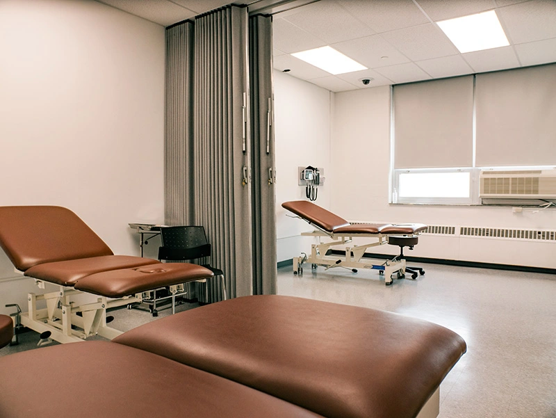 Folding examination tables line the practical examination room provided by the physical therapy department at Arcadia University.