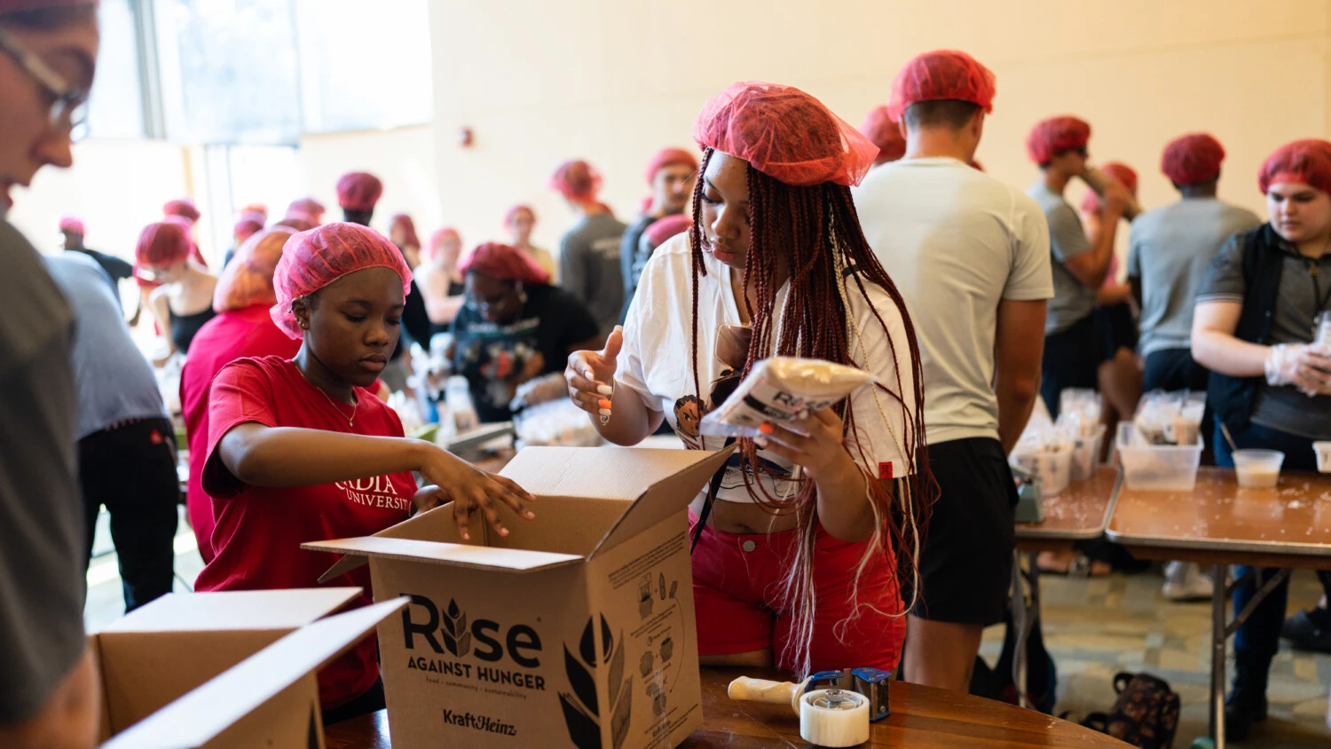 Students participating in the Rise for Hunger Service