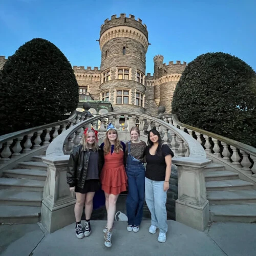 Lily Roberti ’28 and her friends in front of the castle.