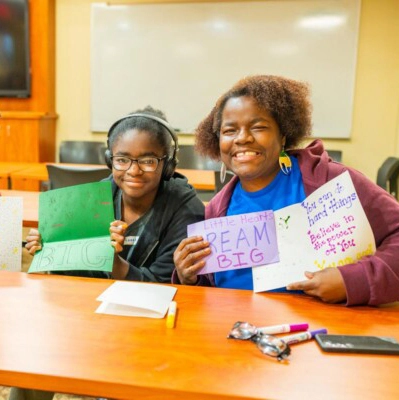 A mother and her daughter craft greeting cards during a Martin Luther King event at Arcadia University.