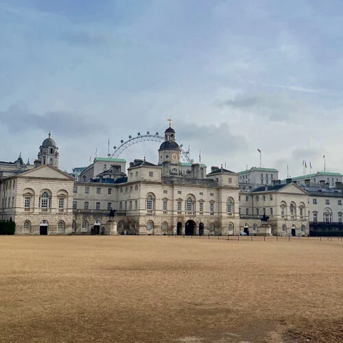 The Royal Mews, Buckingham Palace’s horse stables, with the London Eye visible in the back.