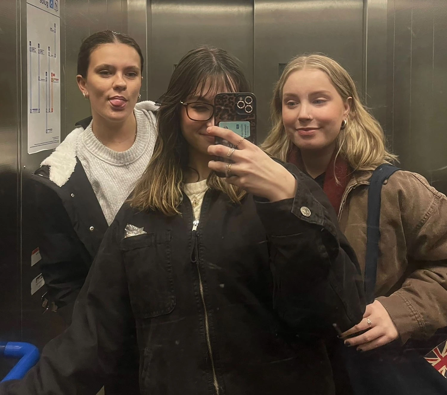 Lily Roberti and friends in an elevator.