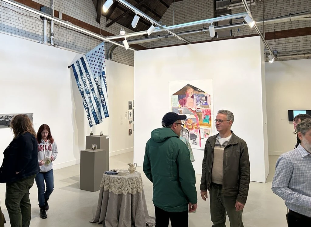 Faculty and staff in Spruance Gallery.