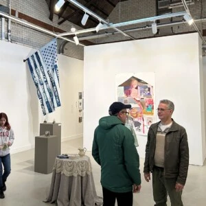 Faculty and staff in Spruance Gallery.